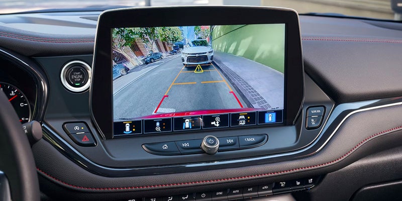 Rearview camera display in a 2020 Chevrolet Malibu, showing a clear view of the area behind the vehicle.