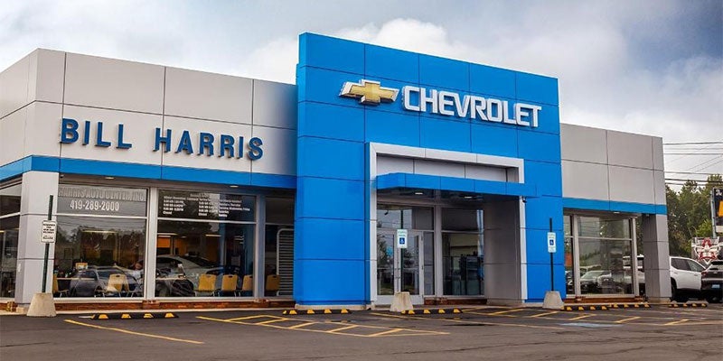 Chevrolet Bill Harris dealership exterior in the Philippines, showcasing modern architecture and a variety of vehicles on display.